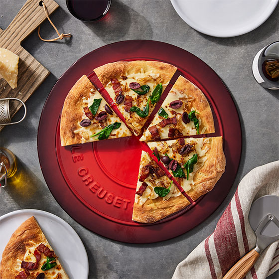 pizza with shallots, bacon and greens
