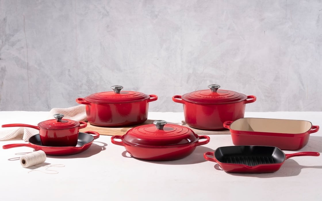 assorted enameled cast iron cookware pieces