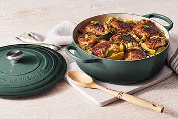 roasted chicken in a wide dutch oven