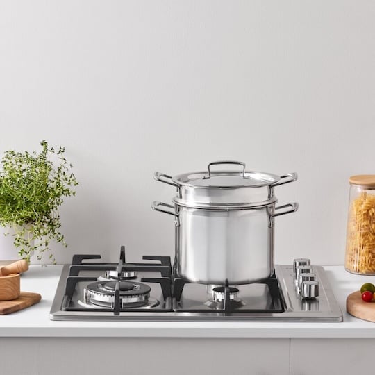 stainless steel cookware on a gas stovetop