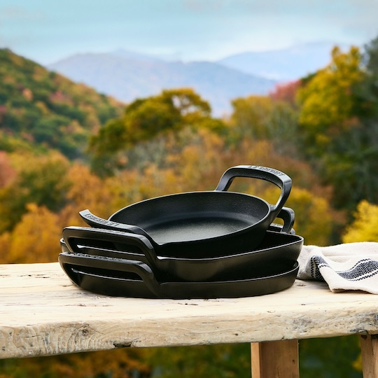 stack of alpine outdoor cookware items