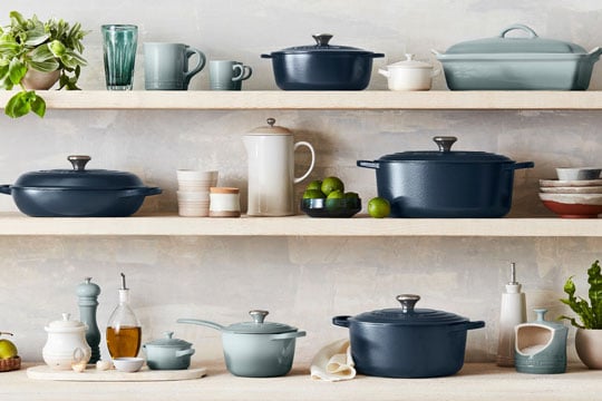assorted cookware including mate navy and sea salt light green