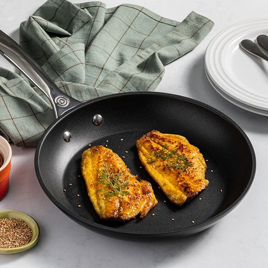 fish filets in a non-stick pan