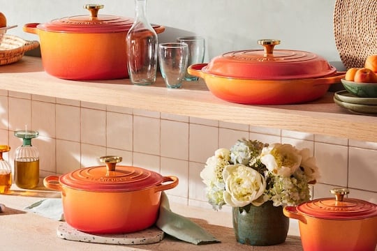 shelves of Flamme Dorée cookware