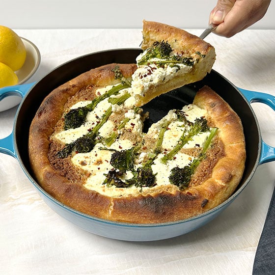 deep dish pizza with greens