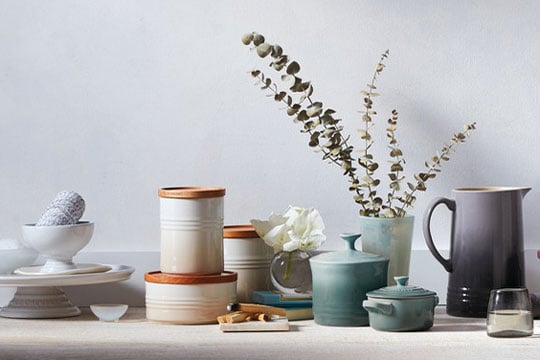 assorted cookware in calm neutral colors