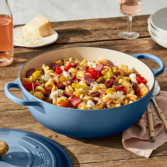 pasta salad in a blue chef's oven