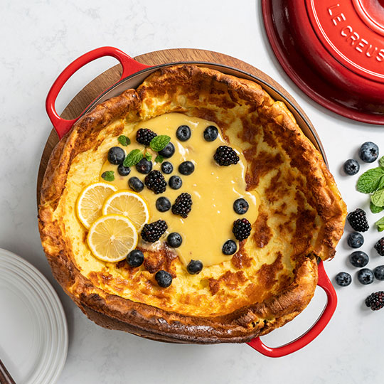 large filled pancake in a braiser