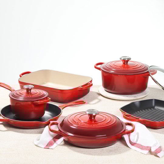 large set of cerise red cookware
