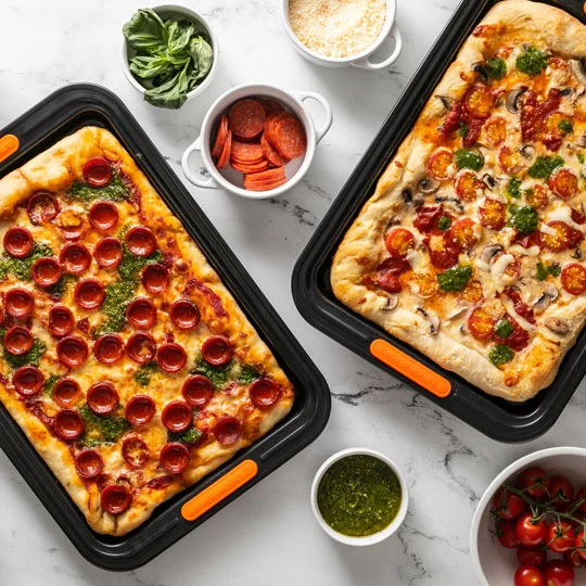 pizzas on non-stick sheet pans