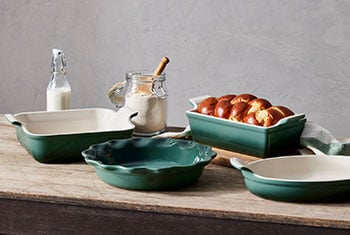 assorted green bakeware items