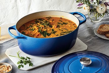 blue dutch iven filled with soup