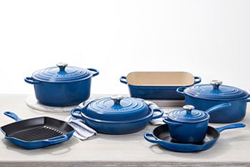 set of cast iron cookware in blue