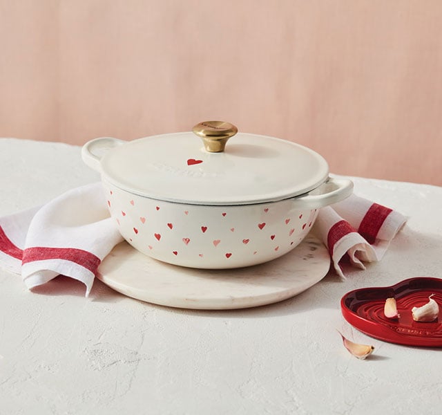 https://www.lecreuset.com/on/demandware.static/-/Sites-LeCreuset-Library/default/dw40ed6380/images/blog/products/hearts/LAmour-Soup-Pot-640x600.jpg