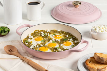 egg-topped casserole in a braiser