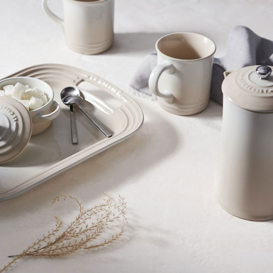 coffee service in cream colored meringue stoneware