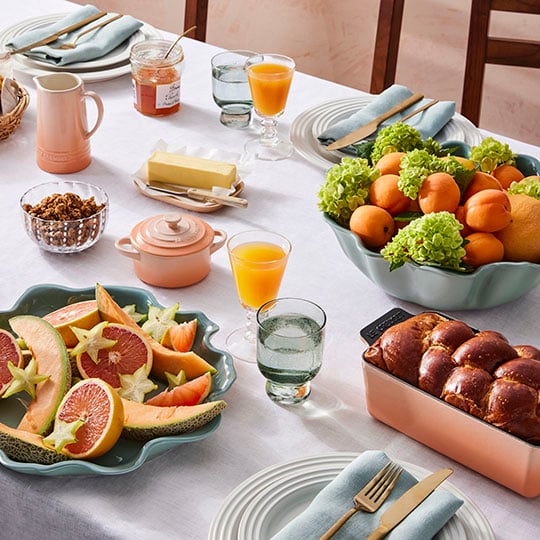 iris collection in sea salt used to add a stylish touch to a fruit-forward brunch tablescape