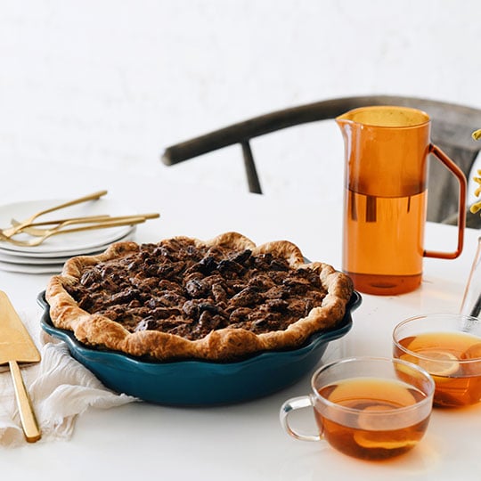 pecan pie served with hot tea