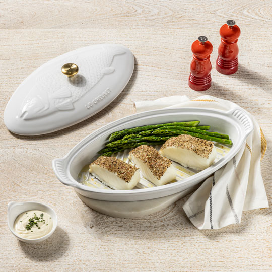 cutlets of peppered fish in a white fish baker