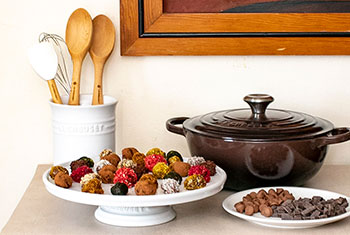 assorted truffles on a serving stand