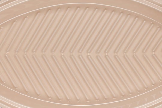 raised ridges in the base of the fish baker