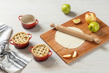 making tiny apple pies in mini cocottes