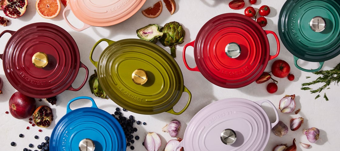 colorful dutch ovens and ingredients