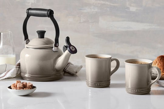 tea kettle and mugs in nutmeg