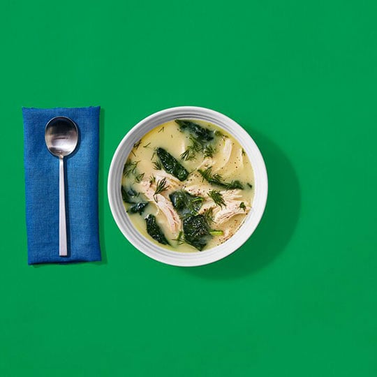 comforting soup in a white bowl