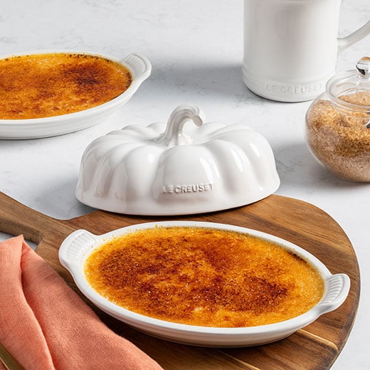 creme brulee in a pumpkin-shaped dish