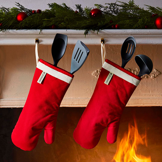 oven mitts hang like stockings by the fire