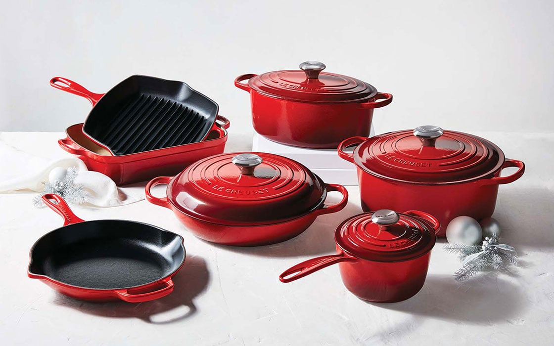 large set of red cast iron cookware