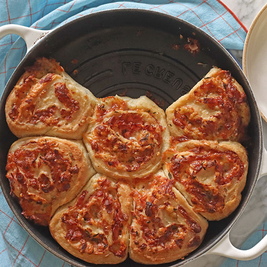 cheesy bread spirals in a bread oven