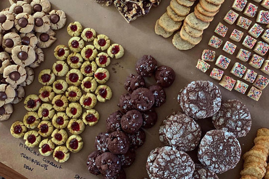 assorted cookies spread out on a table