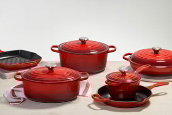 large set of red cast iron cookware