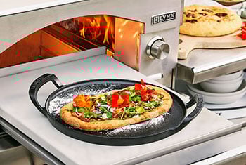 links to recipe for Vegetable Flatbread with Almond Arugula Pesto