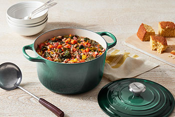deep dutch oven filled with veggie stew