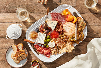 cheese board served on a white platter