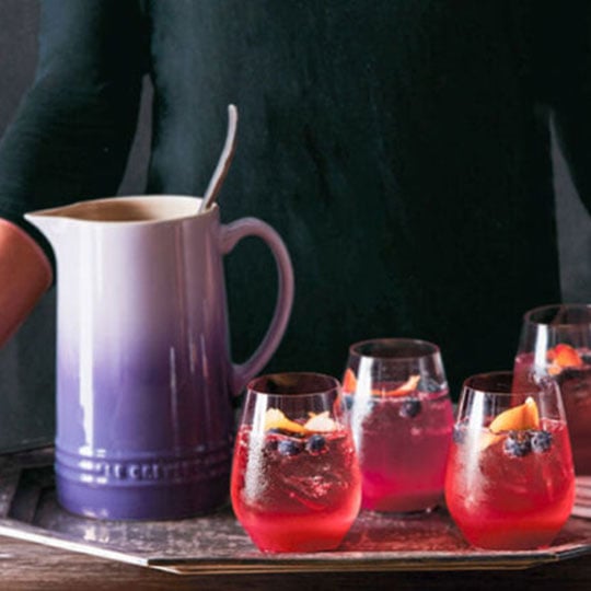 purple drinks in stemless wine glasses
