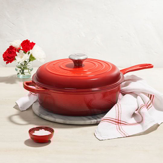 deep covered skillet - also known as a cassadou - in cerise red