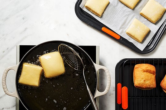 frying brioche doughnuts