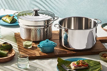 fish next to a stainless steel pot