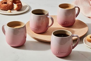 pink mugs of coffee