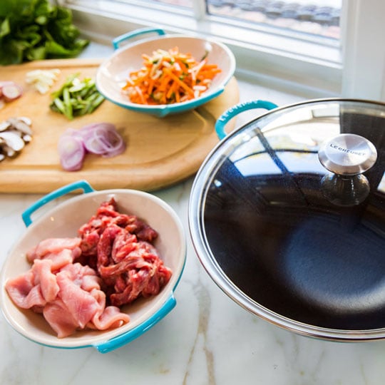 ingredients prepped next to wok