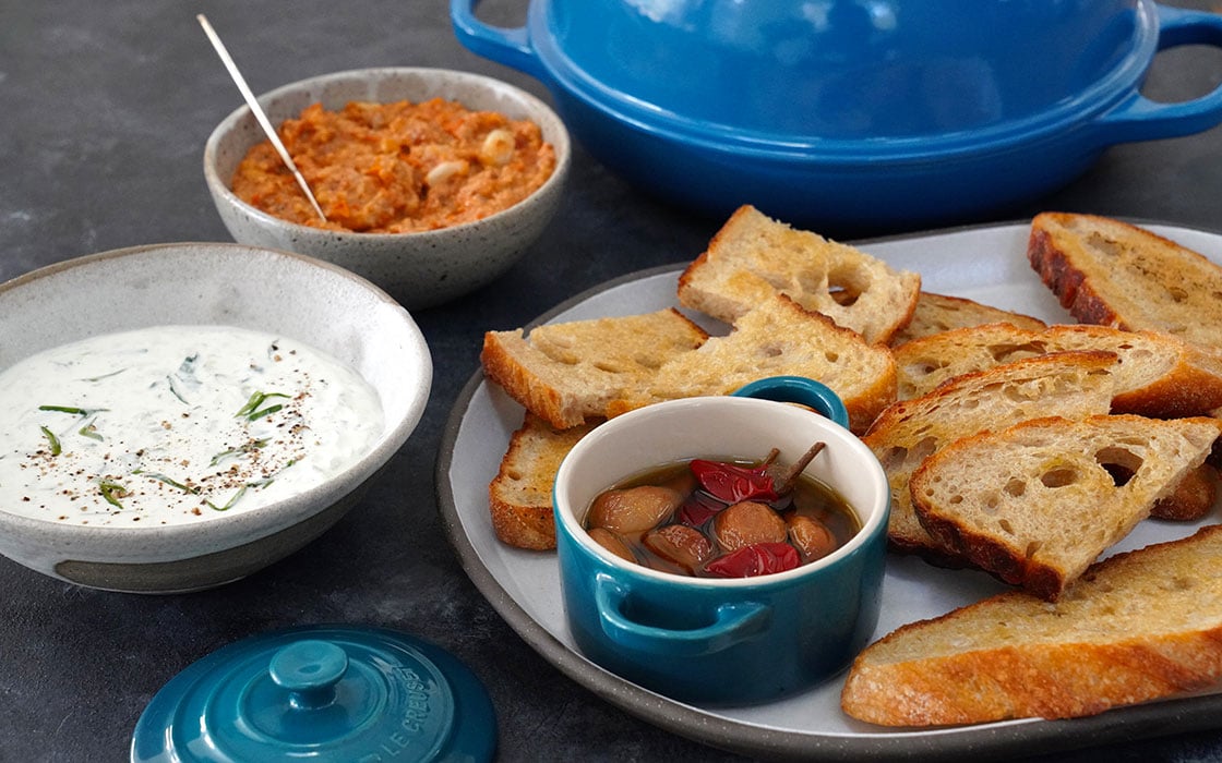 dips and olives with bread