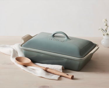 light sage green covered baker