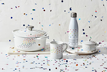 white cookware decorated with colorful hearts
