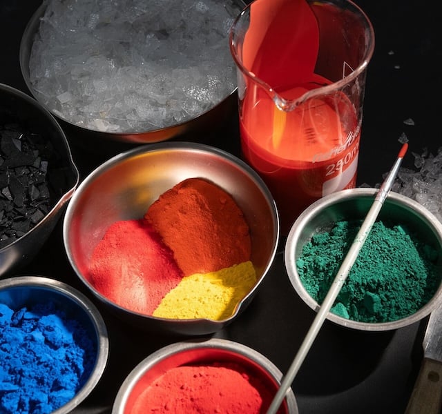 colorful powders in bins