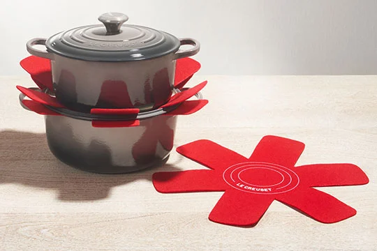 https://www.lecreuset.com/on/demandware.static/-/Sites-LeCreuset-Library/default/dwcb90864c/images/blog/tips-techniques/store/Cookware-Protectors-540x360.jpg