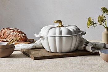 cocotte shaped like a pumpkin with an elegant stem knob